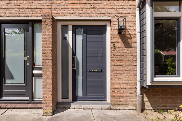 Foto - Verkocht onder voorbehoud: Instapklare tussenwoning op een rustige, autoluwe locatie!